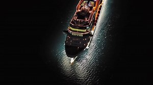 clip-1095434531-aerial-view-illuminated-large-cruise-ship-sea