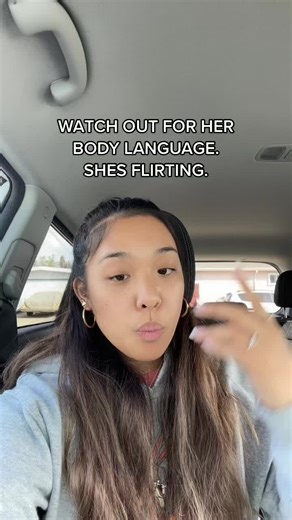 Body Language Signs of Interest: How Women Flirt