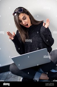 Beautiful young woman having Zoom video conference call via smart phone. Zoom Call Meeting. During Covid-19 Coronavirus pandemic Stock Photo - Alamy