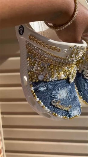 Denim Pearl Luxe Custom Clogs. Luxury comfort, redefined. 💎 Crafted from authentic Crocs® and transformed by hand with premium denim, hand-set pearls, and gold chain details for a couture finish. 👑 ✨ Lightweight. Comfortable. Statement-making. ✨ Personalize yours with a name or initials for a truly one-of-one pair. ✨ Securely set bling & charm — wash and wipe, no peeling. Limited handmade pairs available. Tap Shop Now and claim yours before they’re gone. https://urbanpickus.com/products/denim-