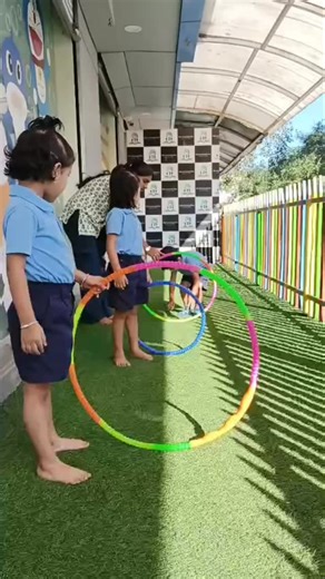 D' Learning Tree on Instagram: "Crawl, crouch, and conquer! 🤸‍♀️ Watching these little champions master the hula hoop obstacle course is the best part of our day. Developing those motor skills and having a blast! ​ #PreschoolFun #HulaHoopChallenge #KidsFitness GrossMotorSkills PlayBasedLearning TinyChamps SchoolLife"