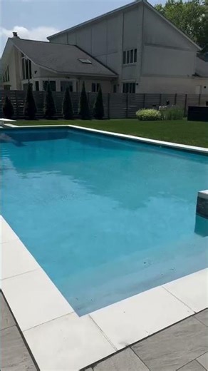 Dive into Luxury: Stunning Pool with Spa, Lounge Area, and Modern Fire Pit