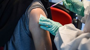 Swollen Lymph Nodes After COVID Booster Shot? Here's What Experts Say That Means