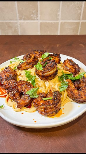 Brian Gerwig on Instagram: "Cajun Shrimp Alfredo! This was so good! * Season your shrimp with your favorite Cajun rub * Cook shrimp in skillet for 2 mins per side until IT reached 120° and then set aside * Add in 2 tbsp butter and 3 cloves of minced garlic to the pan * Add in 1 cup chicken broth, 1 Tbsp cornstarch, 1 cup heavy whipping cream and 1 cup grated Parmesan cheese * Cook fettuccine noodles then add to pan and thickened sauce * Top with shrimp and fresh parsley * Enjoy"