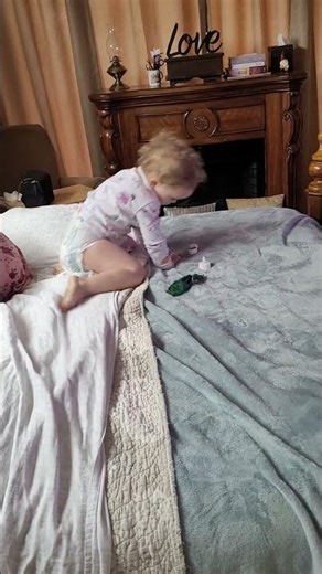 Addi makes a tiny swing for Avey on the bed 3/3/2026 #sisters