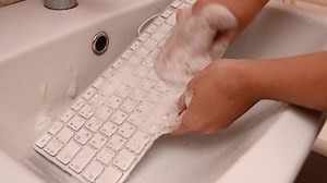 Woman Washing White Computer Keyboard Sponge Stock Footage Video (100% Royalty-free) 1086143786 | Shutterstock