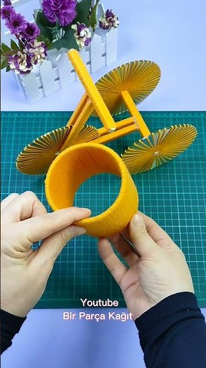 Making decorative bicycle with old cds