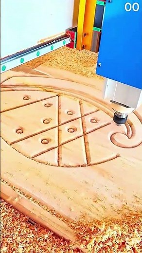 CNC machine engraves circle, triangles form precise wooden pattern