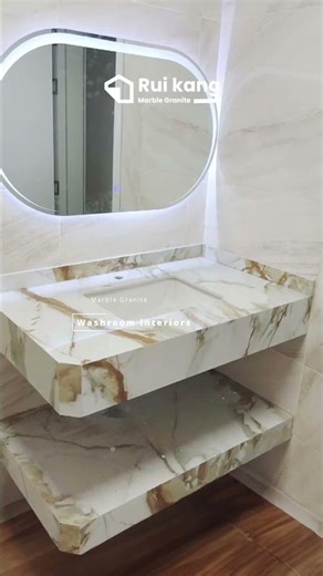 The Granite Shower Threshold That Lights Up When Wet.