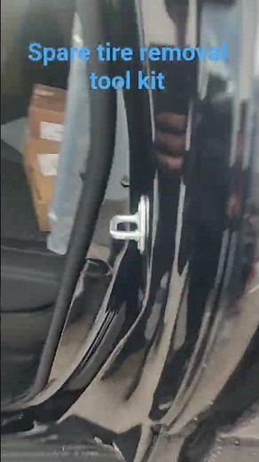 Toyota tacoma spare tire removal tool kit location