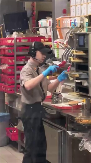 Shocking moment fast food worker is caught spitting in burger | The Sun