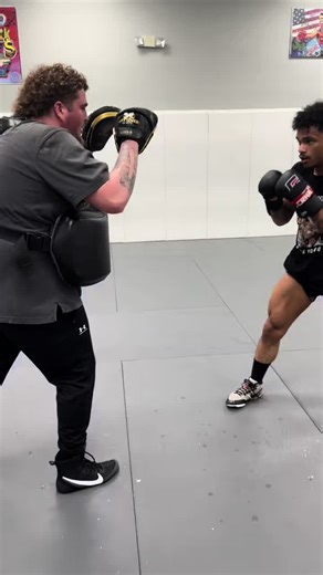 Working the pads with 8–2 professional mixed martial artist Mo Zwolak. Every round is about sharpening the tools — tightening the combinations, dialing in the timing, and making sure every strike lands with purpose. Fighters like Mo understand that the real work happens long before the lights, the walkout, and the crowd. It’s built in the quiet rounds, the constant adjustments, and the commitment to getting better every single session. 8 wins, 2 losses, and still evolving — focused, dangerous, a