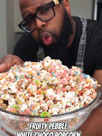 Fruity Pebbles White Choco Crunch Popcorn! Full recipe 👇🏿 #shorts #food #recipe FRUITY PEBBLES WHITE CHOCOLATE CRUNCH POPCORN Yield: 8–10 servings INGREDIENTS ½ cup popcorn kernels 1 tablespoon neutral oil 1 tablespoon butter 12 ounces white chocolate 1 tablespoon coconut oil 2 cups whole Fruity Pebbles cereal 1 cup finely crushed Fruity Pebbles cereal INSTRUCTIONS 1.Line a baking sheet with parchment paper. 2.Heat the oil and butter in a large covered pot over medium heat. Add the popcorn ker