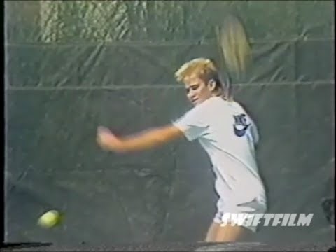 young ANDRE AGASSI working on forehand