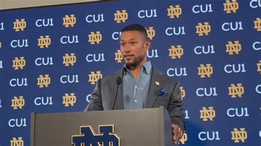 Notre Dame football coach Marcus Freeman offers an explanation after losing to Ohio State