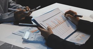Accountant or banker making calculations Bookkeeper Clerk, Bank Advisor And Auditor. Accounting concept.