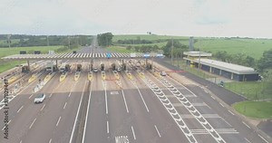 Aerial image highway toll plaza and speed limit, view of automatic paying lanes, non-stop.