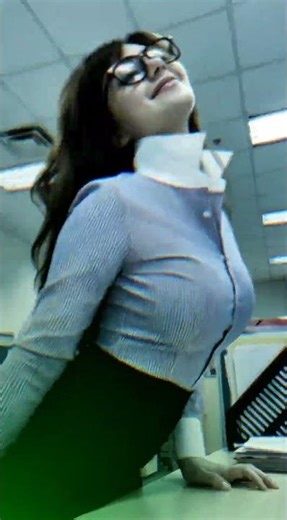 Your Employee know how great way to wear her blouse in office (Popped Collar)