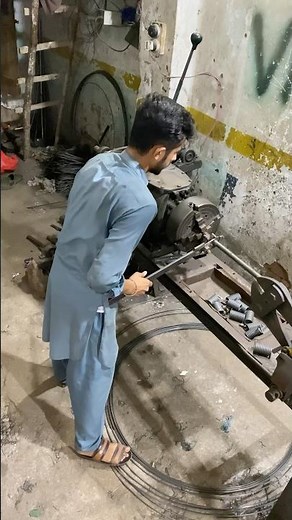 Turning a wire into a perfect spring on lathe -by hand skilled man #shorts