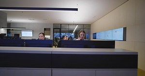 clip-1056395522-security-control-room-operator-work-system-looking