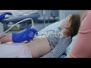 Doctor Examining Girls Belly with Ultrasound | Stock Footage - Envato elements