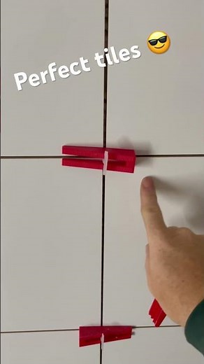 Perfect tiles with DTA wedge lippage tiling system Australia #tiling #tiler #tilelevelling