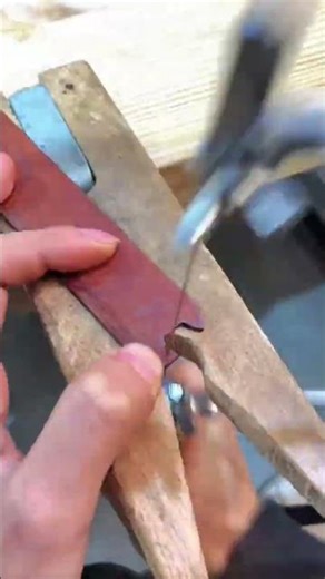 making wooden bookmark using handheld fret saw tool