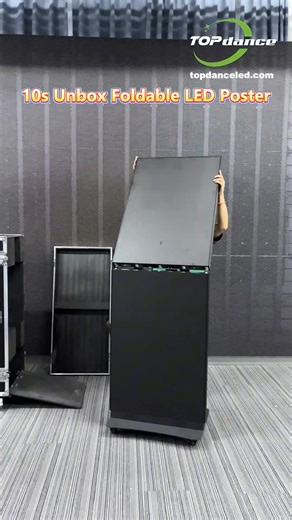 📦 Unbox the Foldable LED Poster — Ready in Minutes! Open the side panels → mount the transit board → roll it out on wheels → plug in and power up. Choose big screen mode or switch to dual-side display — fast setup, instant impact. 🚀 📱 WhatsApp: 86 199 2436 2915 📧 sales6@pro-toplight.com 🌐 https://topdanceled.com/product/foldable-poster-led-display/ #foldableledposter #ledposter #leddisplay #eventrental #advertisingdisplay #eventplanner #stagedesign #factory | TOP Dance LED Dance Floor