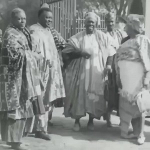 His Royal Majesty, the Ooni of Ife, Oba Adesoji Aderemi (surrounded by his Chiefs, his daughter and other Yoruba companions including Ladoke Akintola), visiting the London Tower. #yorubablog Credits:Emini Dafidi/Colonial Films Unit | Yoruba Blog