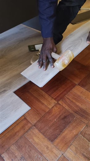 Worn wood block floors transformed with SPC Flooring. Installed directly on the existing surface to create a stable, modern floor without removal work. SPC Flooring specifications: • 5.5mm total thickness • 4mm SPC core plus 1.5mm EVA underlay • Waterproof and moisture resistant • Scratch resistant for daily use • Click lock installation with tight joints Packaging and pricing: • 10 pieces per box • Covers 2.19m² • KSh 1,964 per m² • KSh 4,300 per box #spcflooring #spcfloor #spcinstallation #spc