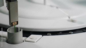 Medical Hematology analyzing machine automatically working for blood testing. Automated process of biomaterial research in modern biochemistry analyzer. Close up. Shot in 4k