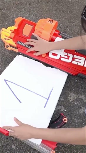 Banana TV: Epic Toy Gun Challenge! Can Team Survive? #NerfWar #Shorts