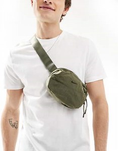 Nike Aura fanny pack in olive | ASOS