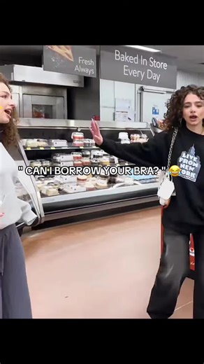 Humorous Bra Borrowing Moment with Friends