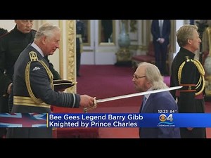 Legendary Musician Barry Gibb Knighted By Prince Charles At Buckingham Palace