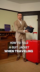 How to Fold your Suit Jacket when Traveling. #howtofold #traveltips #howtofold #suitjacket #packingtips | The Scott Effect