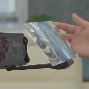 3.4M views · 138 reactions |  Envios à cobrança !! Entrega em 24h  ✅ DESCANSE AS SUAS MÃOS ! ✅ Este suporte é ótimo para Telemóveis/Tablets e liberta as suas mãos do cansaço, principalmente quando está deitado. ✅ Prenda-o à mesa, estrutura da cama, coloque o telemóvel ao nível dos seus olhos. ✅ Amplia a tela do seu telemóvel para facilitar a visualização de vídeos, notícias, filmes etc…. aliviando o desconforto e a fadiga visual. | Techno -Store | Facebook