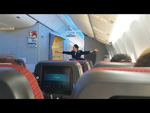 Japan Airlines safety demonstration by cabin attendant
