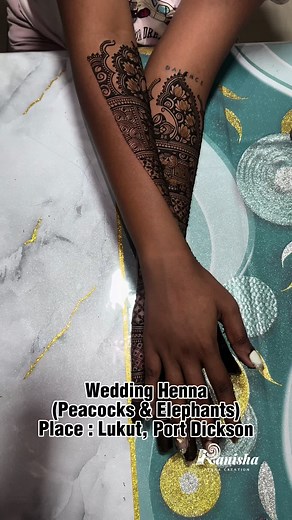 Stunning Henna Art with Peacocks and Elephants