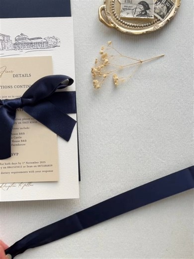 Tying the perfect satin bow for these wedding invitations for a wedding at Kilshane House in Ireland. Don't you love the gold and navy colour palette?! @kilshanshouseweddings #WeddingInspo #luxuryinvitations #irishweddings #irishwedding #irishbride #irishweddingvenues #irishweddingvenue #onefabday