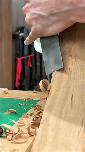 Shaving a Wooden Plank Manually with a Handheld Planer Indoors