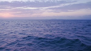 Ocean at night. Wonderful sea view in the choppy ocean.