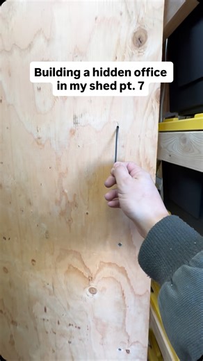 Caleb on Instagram: "The door is installed! It doesn’t look hidden yet! What should I put on the door to make it look more discreet? #diy #diydad #milwaukee @milwaukeetool"