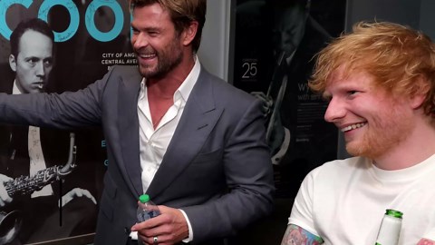 Chris Hemsworth plays drums during surprise appearance at Ed Sheeran concert