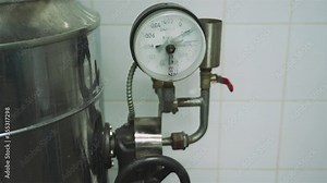 Automatic machine in a food factory for mixing meat and spices for making hot dogs and sausages in a food factory. Close up. Part of sausage production. 4k