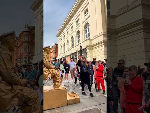 Goldman Statue caught the wrong fish.