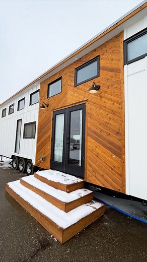 Jen/Trailhead Tiny House on Instagram: "Twice as much as I thought I would spend, but also… twice as nice as I dreamed it would be! #tinymansion #farmhouse #boardandbatten #tinyhouseexterior #chevron #cedarchevron #whitefarmhouse #tinydreamhouse #barbiedreamhouse #tinyhouse #mitchcraft #tinyhouseinspiration #tinyhouseideas #tinyhousenation #tinyhouseblog #tinyhousebasics"