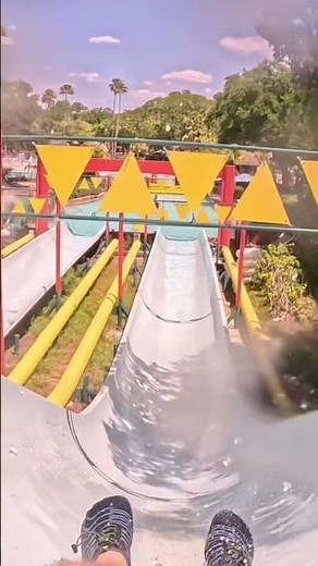 Riding Downhill Double Dipper at Disney's Blizzard Beach Water Park