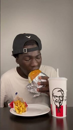 Black man eats kfc chicken sandwich for the first time