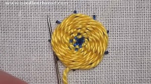 The woven wheel embroidery stitch - a great stitch for adding accents, floral elements, dimension and texture. This is a simple stitch! The key is the odd number of foundation spokes. If you want to read more about it and see some other samples of the stitch, you'll find more information here: https://www.needlenthread.com/2012/07/woven-wheel-stitch-video.html | Mary Corbet's Needle 'n Thread